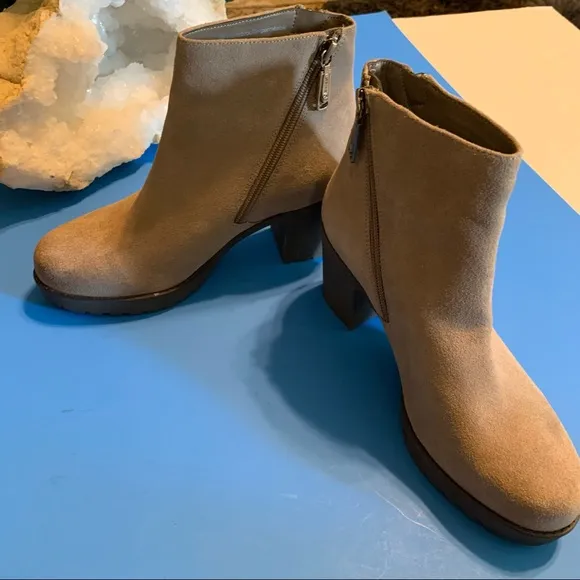 Blonde waterproof heel ankle boots.