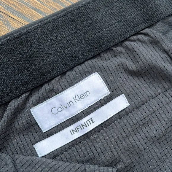 Calvin Klein Men’s Infinite 4-way Stretch Solid Slim-Fit Pants black size 31x32