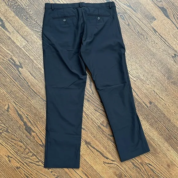 Calvin Klein Men’s Infinite 4-way Stretch Solid Slim-Fit Pants black size 31x32