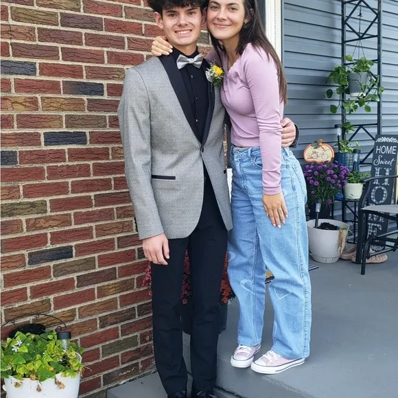 Gray blazer jacket and black dress pants