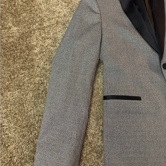 Gray blazer jacket and black dress pants
