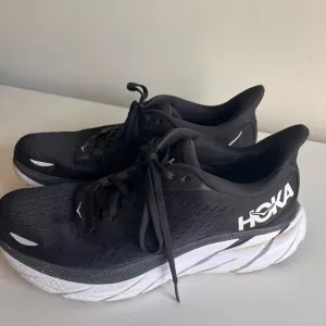 HOKA Rincon 8 women’s running shoes size 10 B black and white good condition