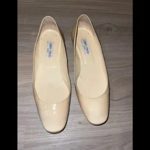 Jimmy Choo  London flat patent cream shoes