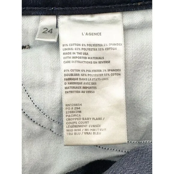 L’AGENCE Mid Rise Cropped Baby Flare Raw Hem Jeans in Tru Blu Size 24