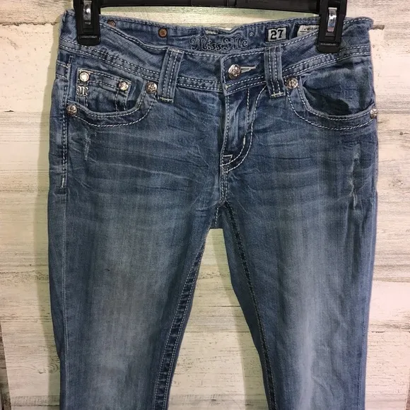 Miss me Womens jeans distressed with horse shoes and cross pockets embellished​​