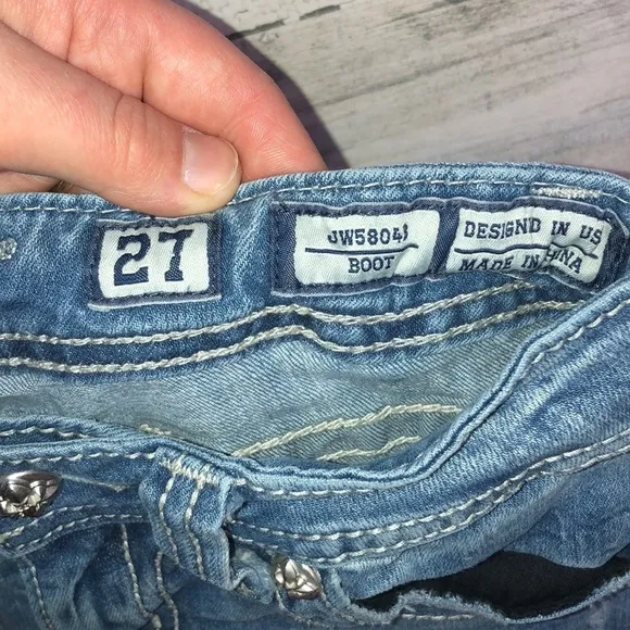 Miss me Womens jeans distressed with horse shoes and cross pockets embellished​​