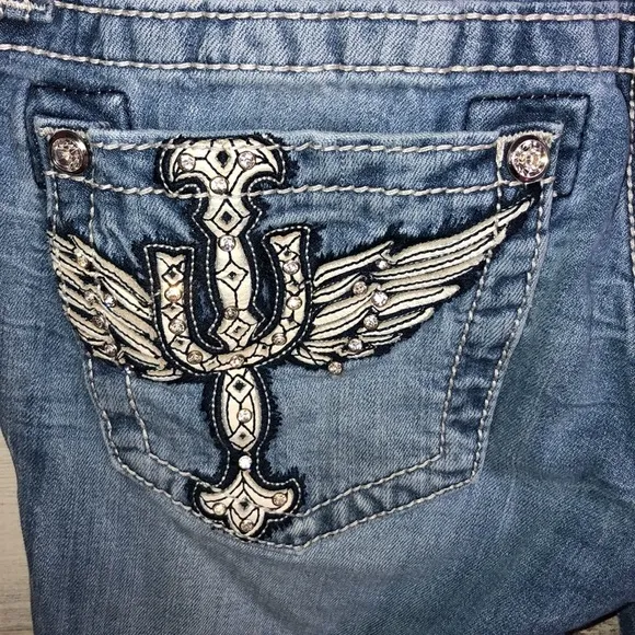 Miss me Womens jeans distressed with horse shoes and cross pockets embellished​​