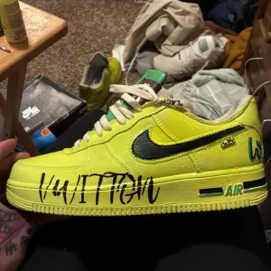 Nike Green and Yellow Athletic Shoes with Custom Graphics