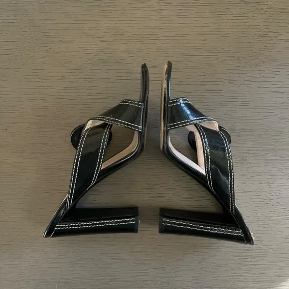 PRADA | Luxury Black Leather White Stitch Criss-Cross Buckle Heel | Size 37.5