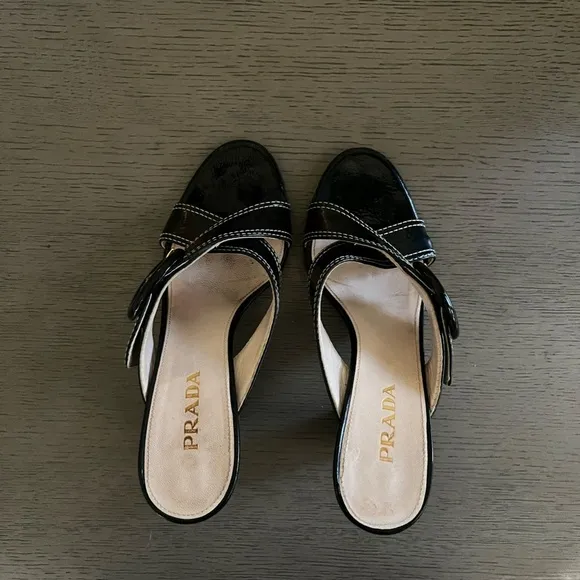 PRADA | Luxury Black Leather White Stitch Criss-Cross Buckle Heel | Size 37.5