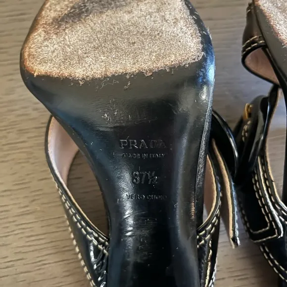 PRADA | Luxury Black Leather White Stitch Criss-Cross Buckle Heel | Size 37.5