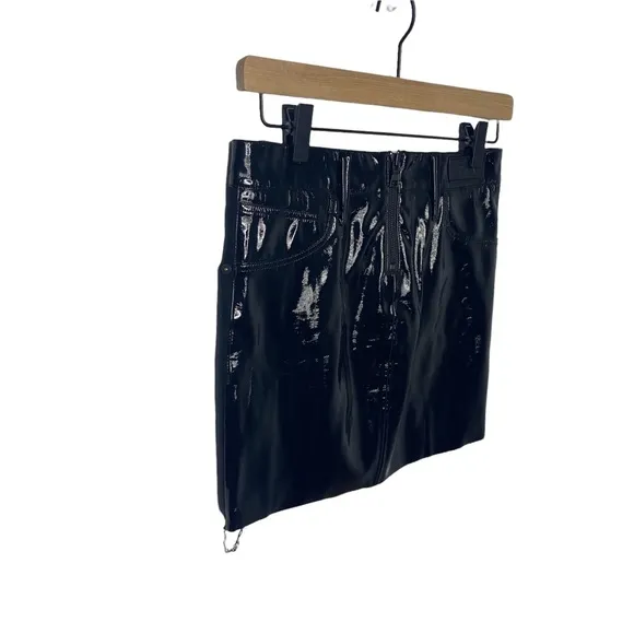 RtA black denim mini skirt -back is patent. Exposed zipper. Raw hem size 0