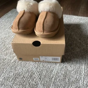 UGG Tan Slippers with Cream Sheepskin Collar