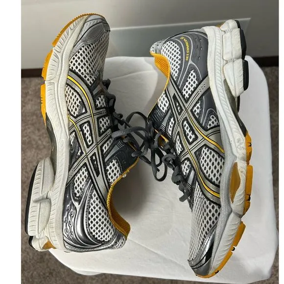 Vintage y2k Men's 9.5 Asics Gel Cumulus 11 Yellow silver metallic sneakers shoes