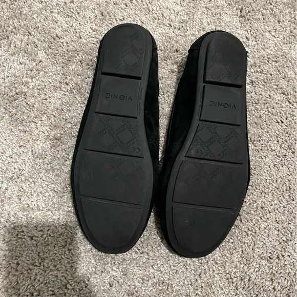 Vionic black suede Mesa loafers with gunmetal/muted silver chain accents