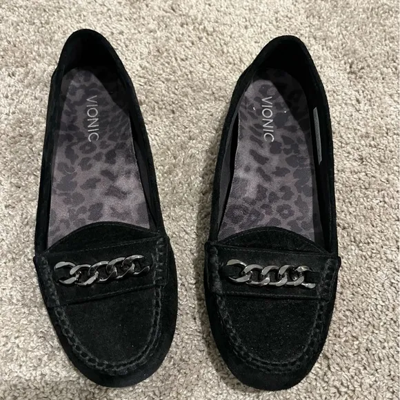 Vionic black suede Mesa loafers with gunmetal/muted silver chain accents